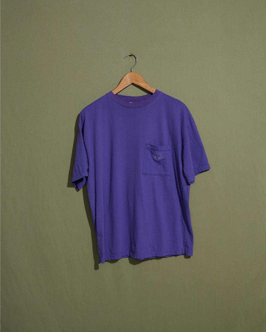 Front view of model wearing Purple Made in USA, Purple Embroidered Tee - M.