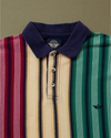 View of model wearing Red, Yellow & Green Vertical Striped Polo, Relaxed Fit - S.