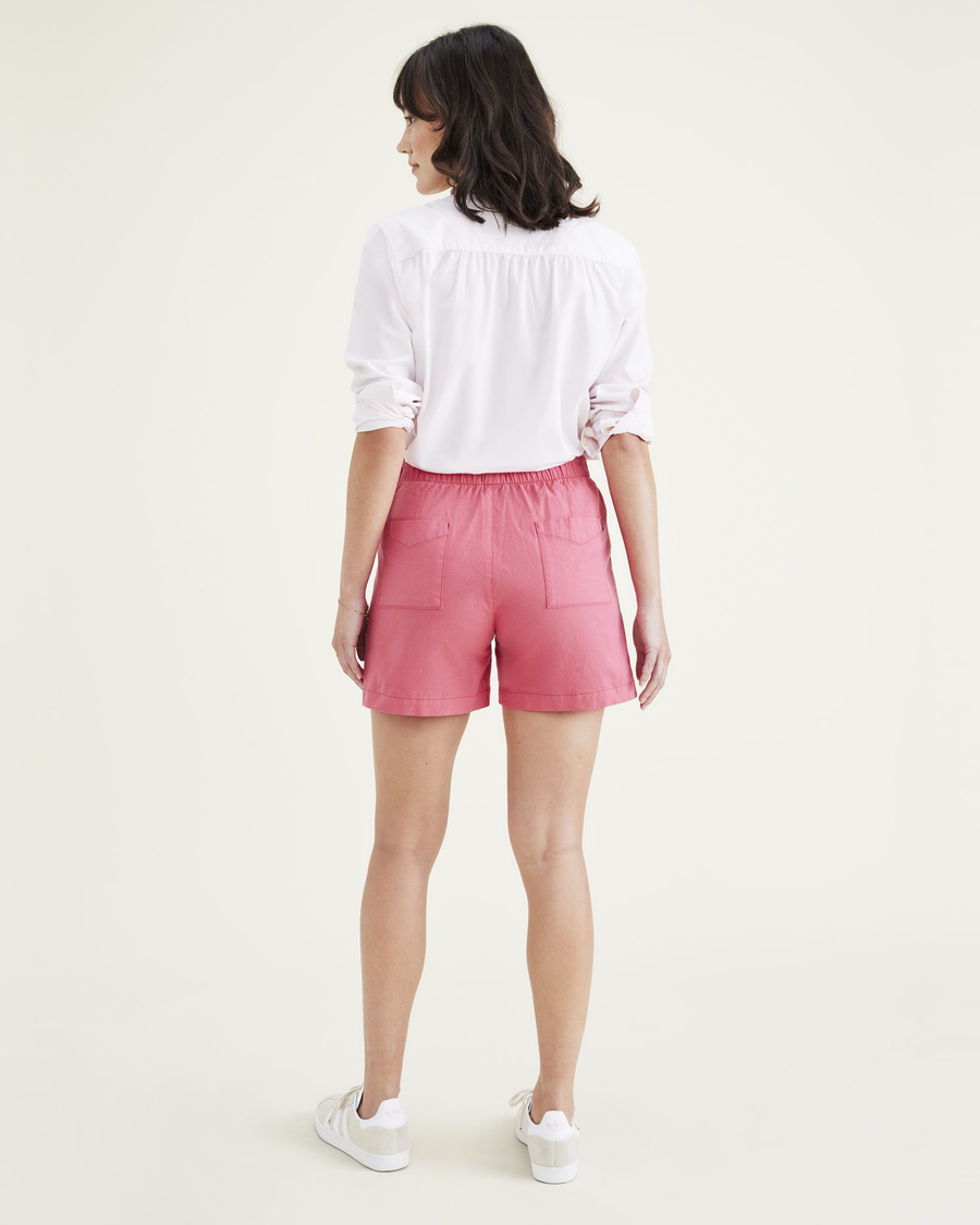 Back view of model wearing Rethink Pink Weekend Pull-On Shorts.