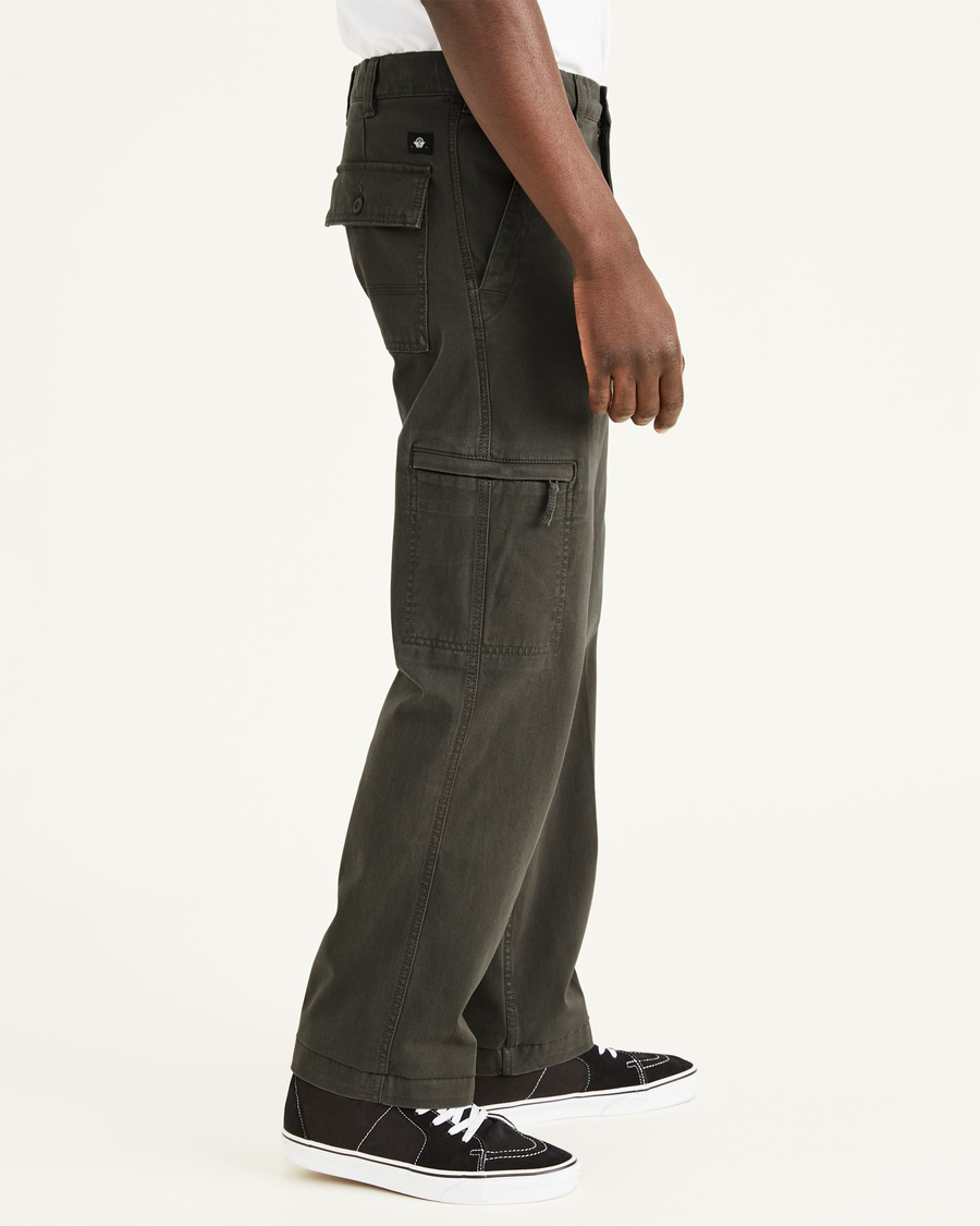 Side view of model wearing Rifle Green Go-To Cargos, Straight Fit.