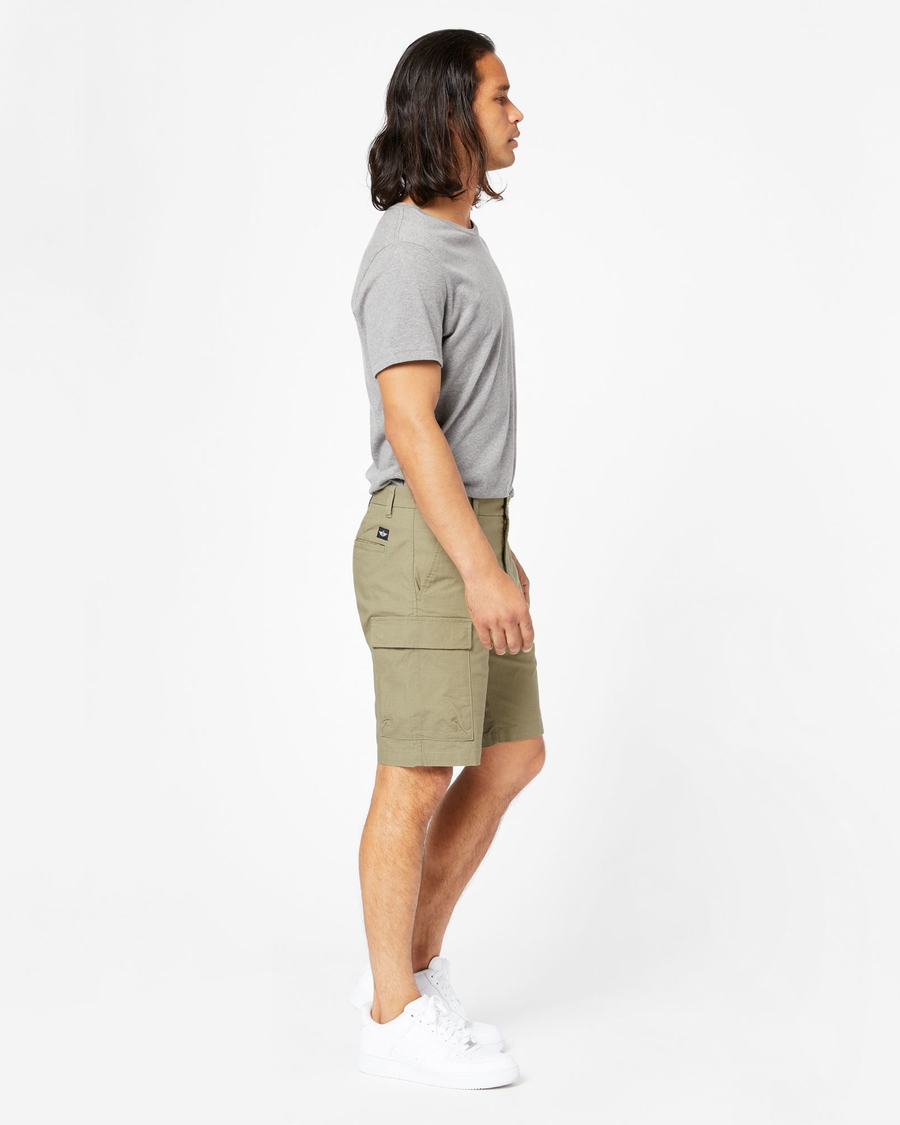 Side view of model wearing Sage Garden Smart 360 Tech Cargo 9" Shorts (Big and Tall).