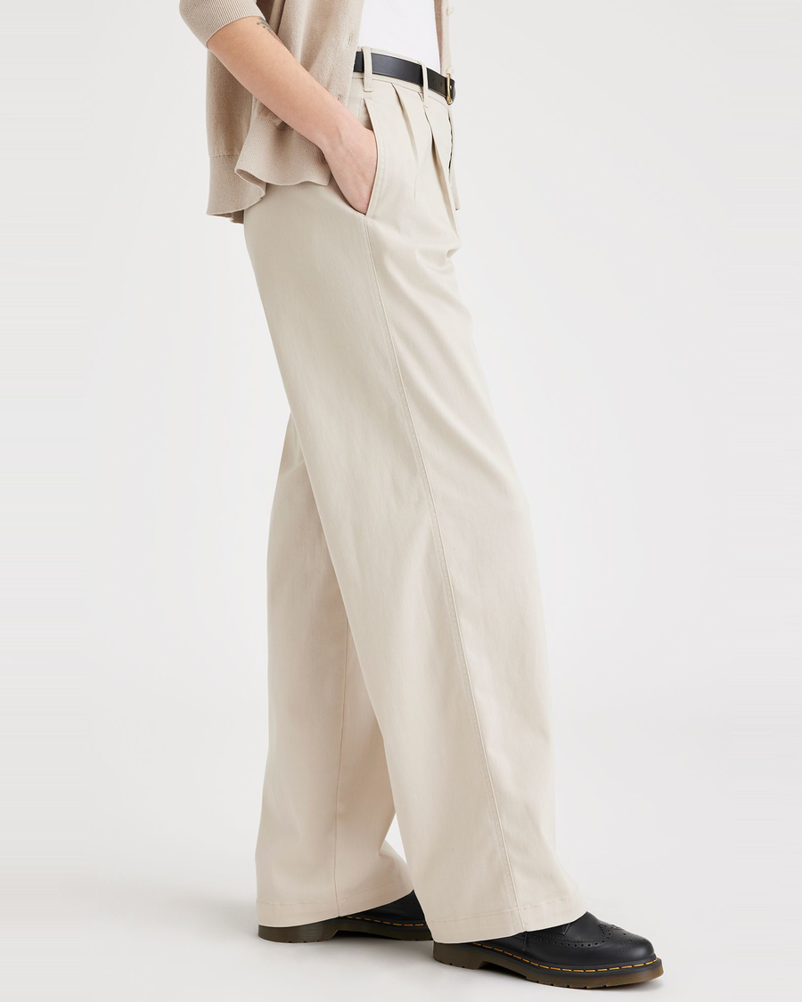 Side view of model wearing Sahara Khaki Beale Pleated Chino, High Wide Fit.
