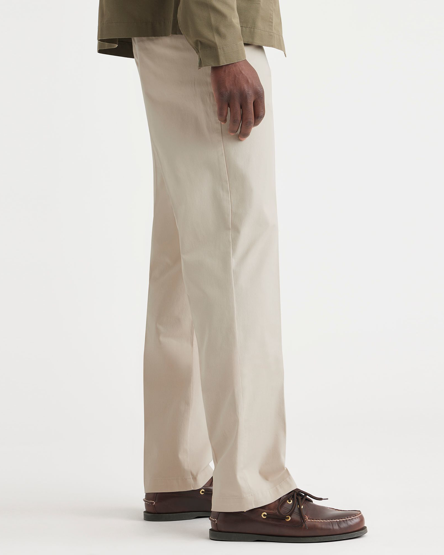 Side view of model wearing Sahara Khaki Essential Chinos, Classic Fit.