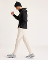 View of model wearing Sahara Khaki Go Pant, Slim Fit with Airweave.
