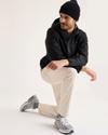 View of model wearing Sahara Khaki Go Pant, Slim Fit with Airweave.