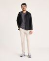 Front view of model wearing Sahara Khaki Go Pant, Slim Fit with Airweave.