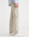 Side view of model wearing Sahara Khaki Ultimate Chinos, Slim Fit.