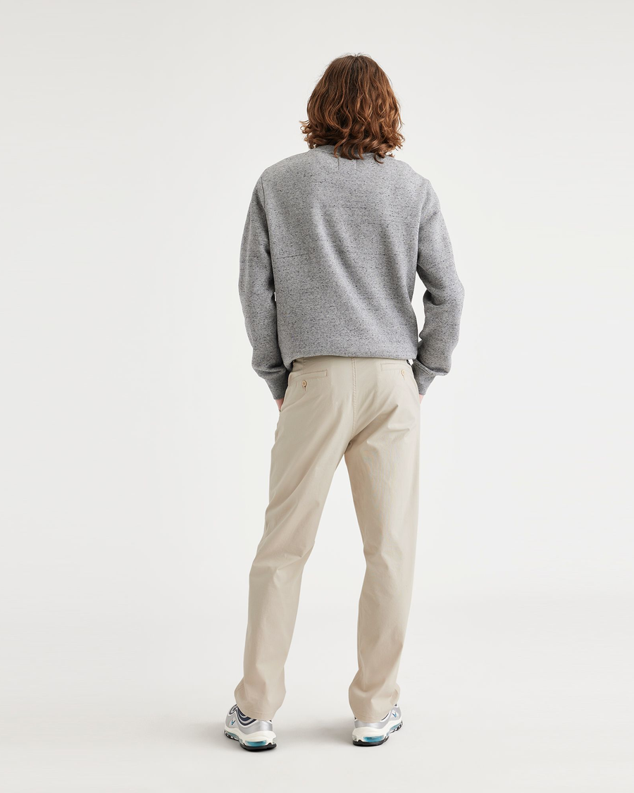Back view of model wearing Sahara Khaki Ultimate Chinos, Straight Fit.