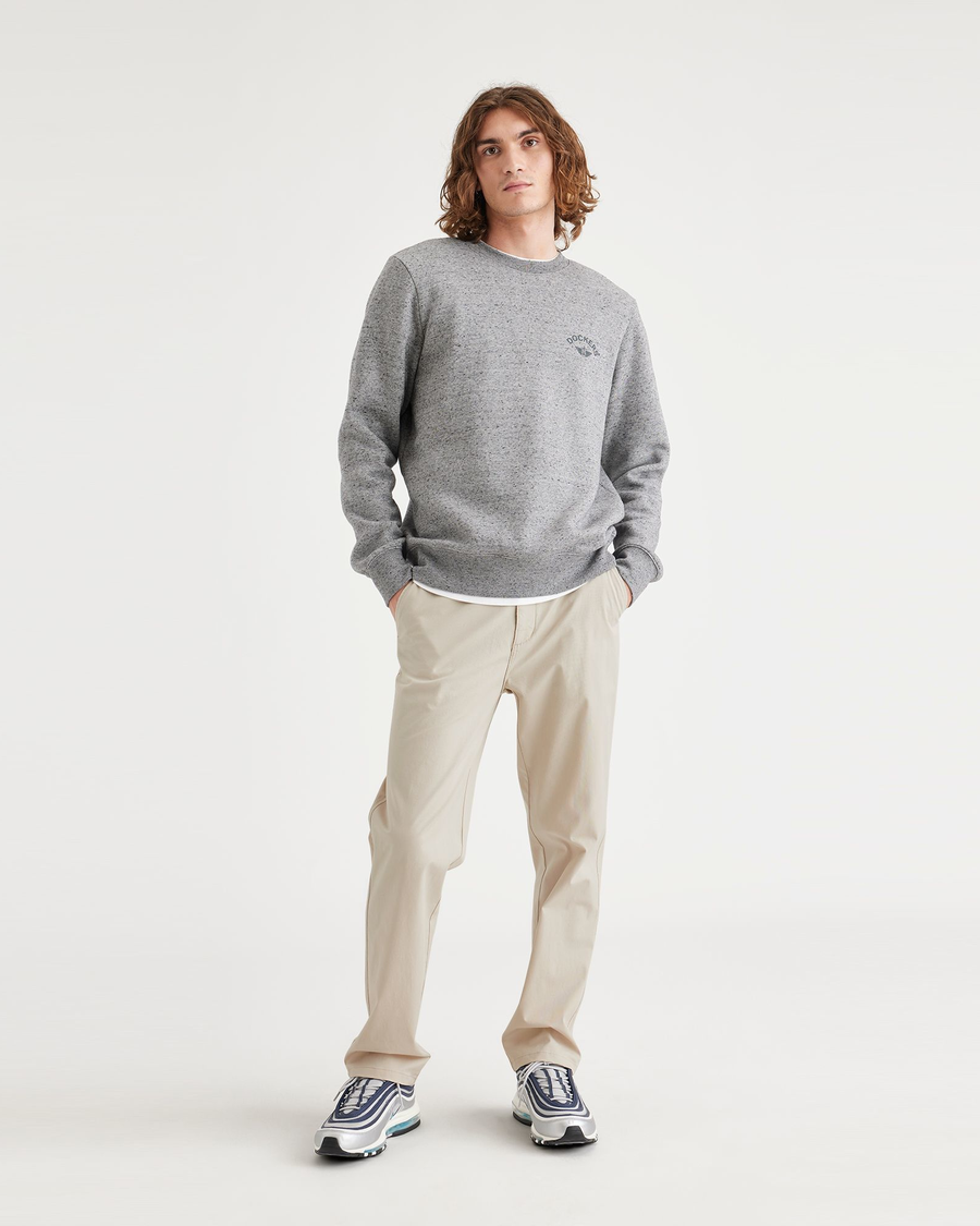 Front view of model wearing Sahara Khaki Ultimate Chinos, Straight Fit.