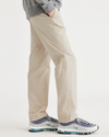 Side view of model wearing Sahara Khaki Ultimate Chinos, Straight Fit.