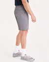 Side view of model wearing Sea Cliff Perfect 10.5" Shorts (Big and Tall).