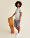 View of model wearing Sea Cliff Perfect Cargo 10.5" Shorts, Classic Fit.