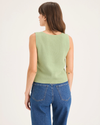 Back view of model wearing Seedling Sweater Tank, Regular Fit.