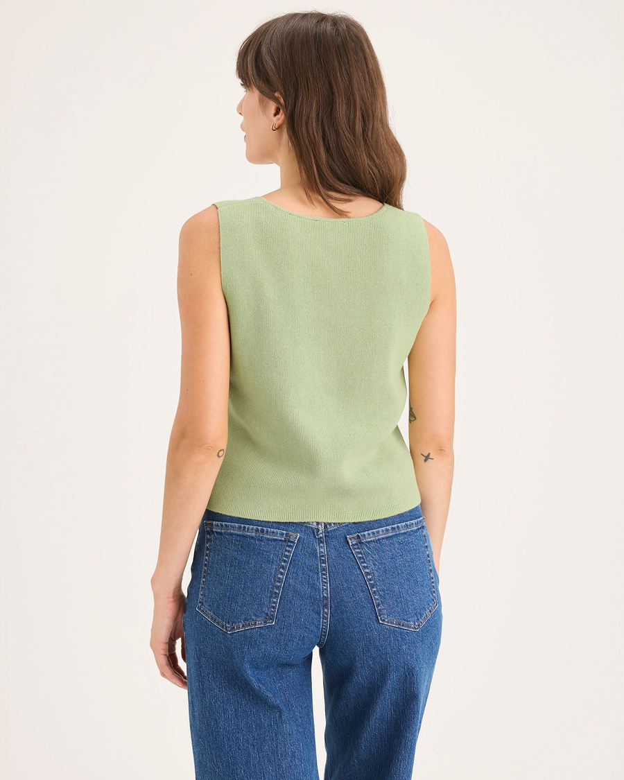 Back view of model wearing Seedling Sweater Tank, Regular Fit.