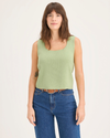 Front view of model wearing Seedling Sweater Tank, Regular Fit.