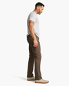 Side view of model wearing Smokey Hazelnut Jean Cut Pants, Straight Fit.