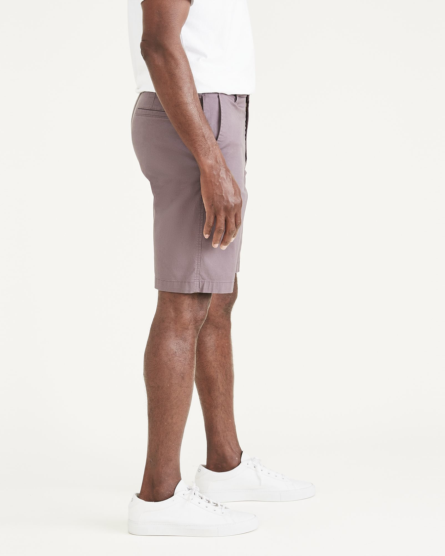 Side view of model wearing Sparrow Ultimate 9.5" Shorts.
