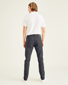 Back view of model wearing Steelhead Jean Cut Pants, Slim Fit.