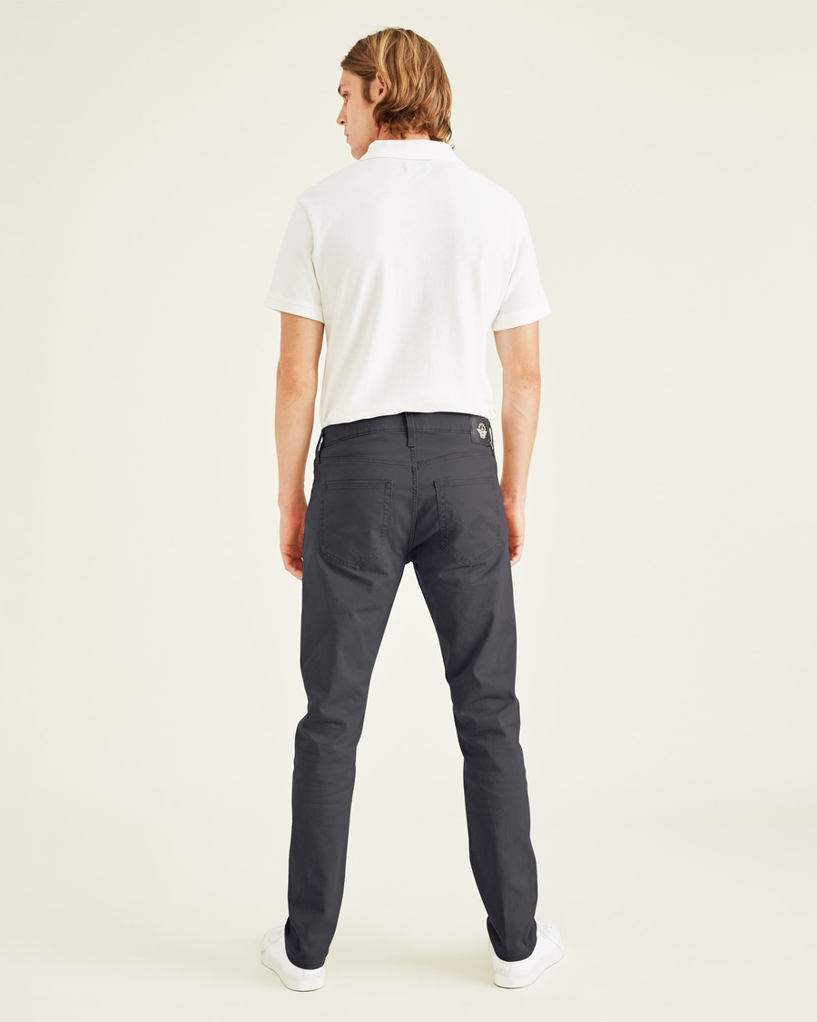 Back view of model wearing Steelhead Jean Cut Pants, Slim Fit.