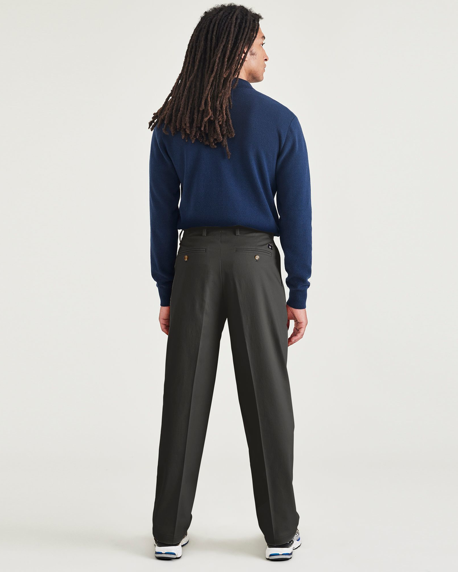 Back view of model wearing Steelhead Signature Iron Free Khakis, Pleated, Relaxed Fit with Stain Defender®.