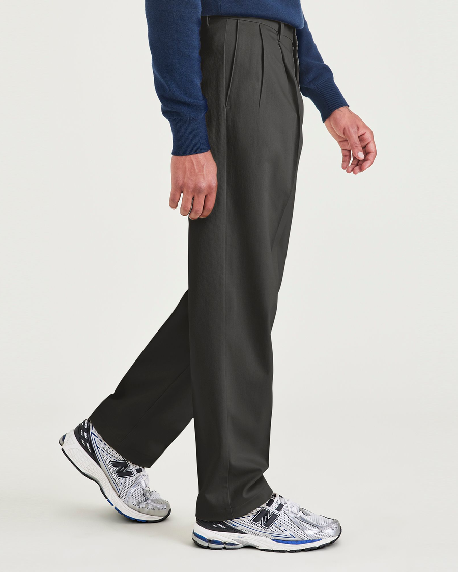 Side view of model wearing Steelhead Signature Iron Free Khakis, Pleated, Relaxed Fit with Stain Defender®.