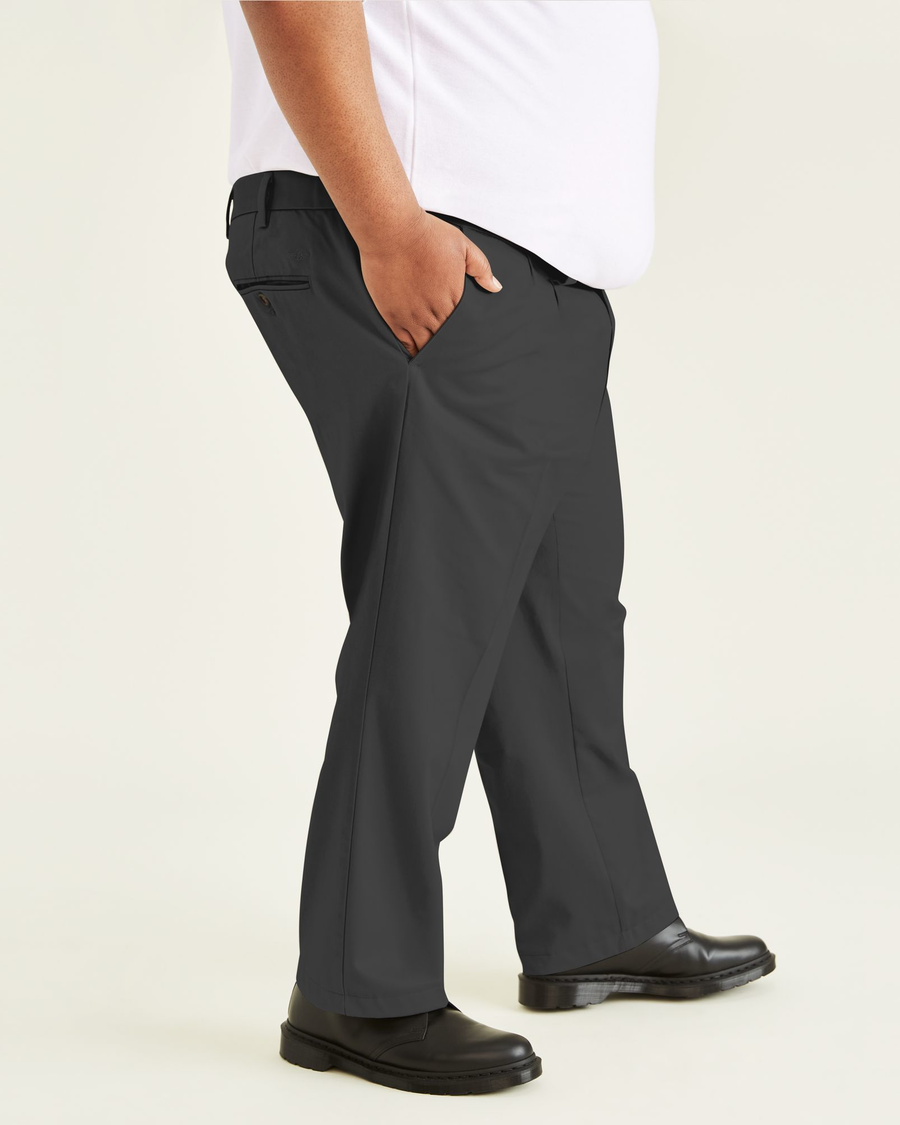 Side view of model wearing Steelhead Signature Khakis, Pleated, Classic Fit (Big and Tall).