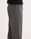 Side view of model wearing Storm Workday Khakis, Classic Fit (Big and Tall).