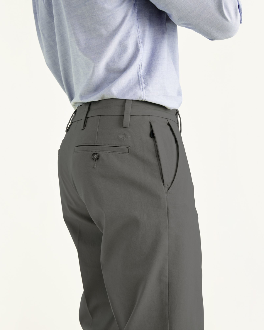 View of model wearing Storm Workday Khakis, Classic Fit.