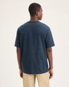 Back view of model wearing Stratified Sea Eighty-Six Tee, Relaxed Fit.