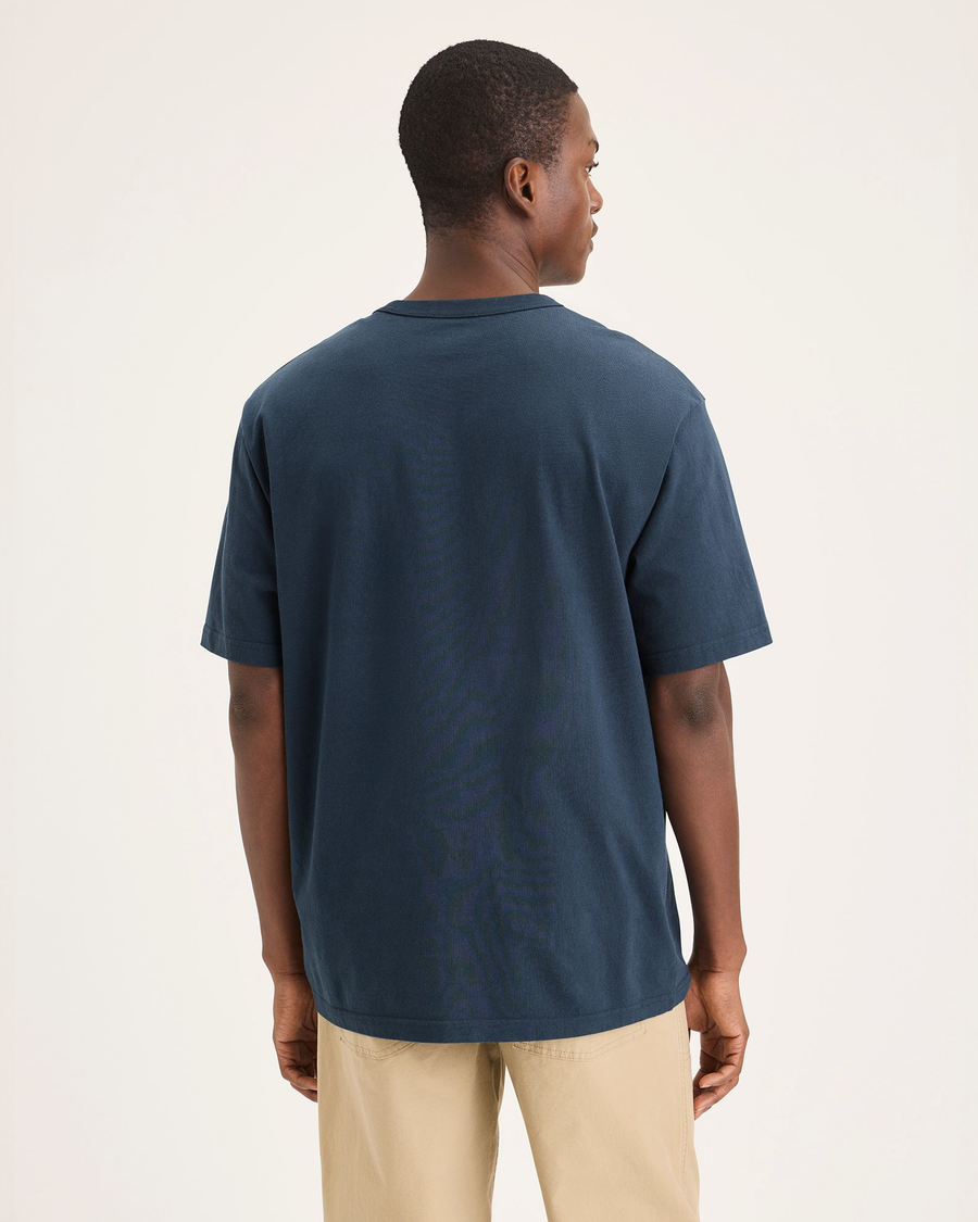 Back view of model wearing Stratified Sea Eighty-Six Tee, Relaxed Fit.