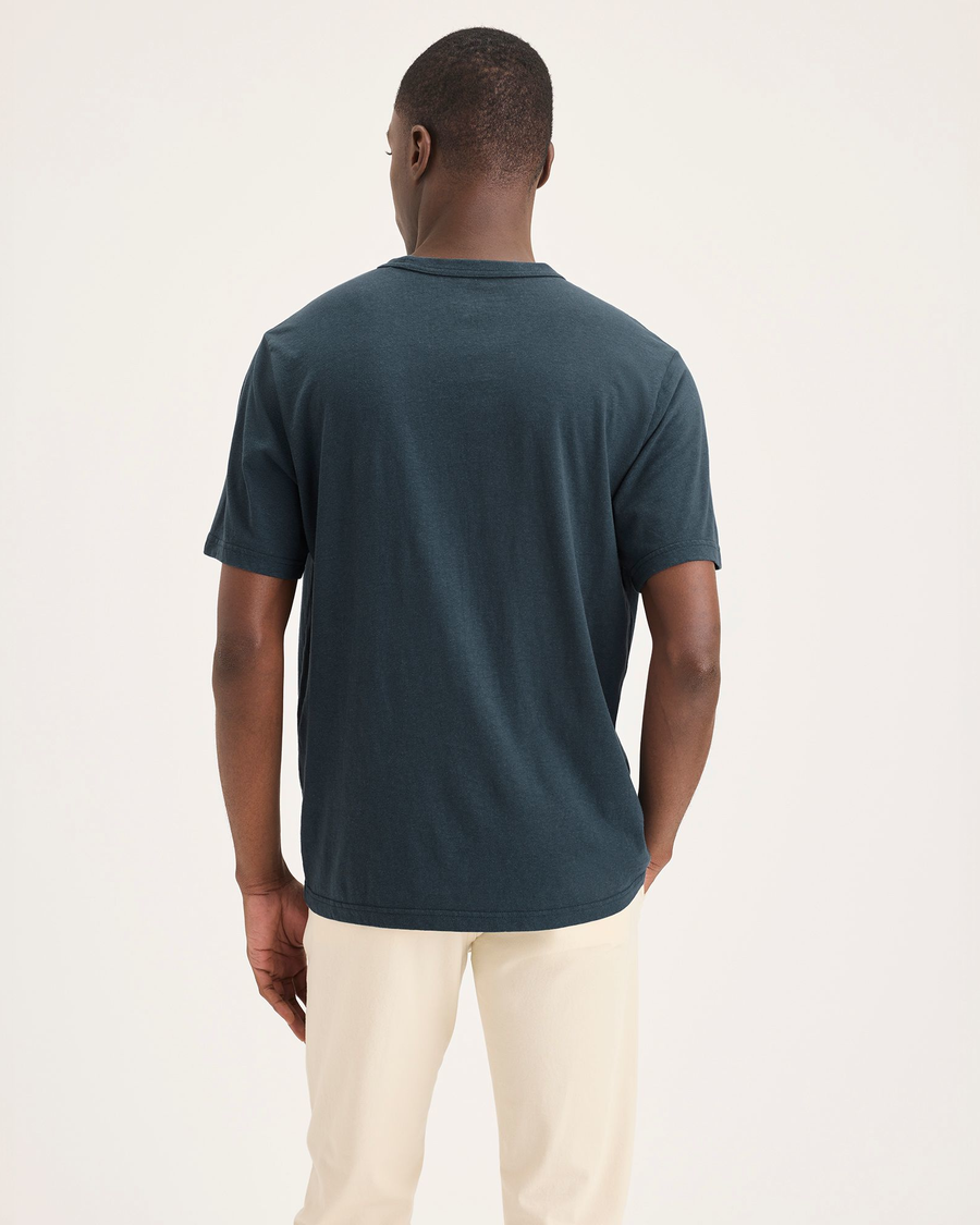 Back view of model wearing Stratified Sea Original Tee, Regular Fit.