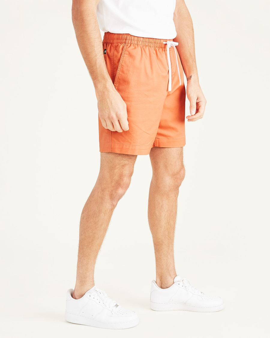 Side view of model wearing Sun Baked Playa 7" Shorts.