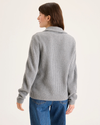 Back view of model wearing Superb Grey Goose Quarter Zip Sweater, Regular Fit.