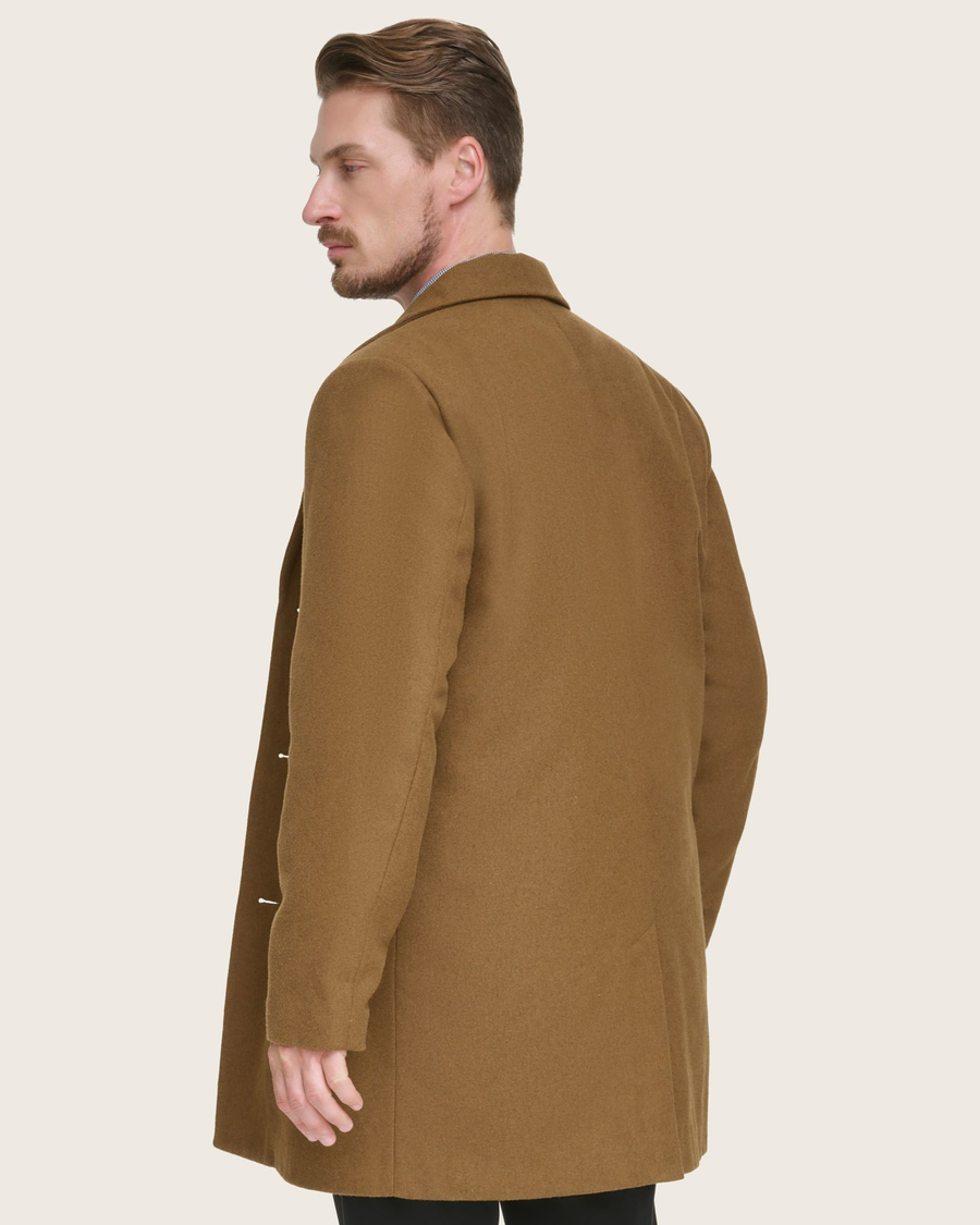 Back view of model wearing Tan Wool Blend Top Coat.