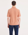 Back view of model wearing Tawny Orange Rib Collar Polo, Slim Fit.