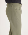 Side view of model wearing Tea Leaf Go Airweave Chino, Slim Tapered Fit.