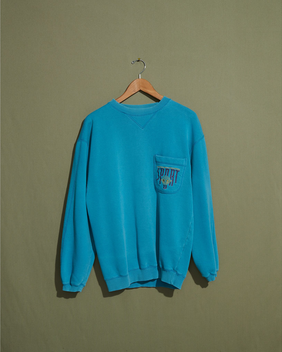 Front view of model wearing Teal Dockers Sport, Crewneck Sweatshirt - M.