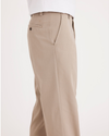 Side view of model wearing Timber Wolf Easy Khakis, Classic Fit.