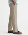 Side view of model wearing Timber Wolf Essential Chinos, Straight Fit.