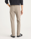 Back view of model wearing Timber Wolf Go Pant, Slim Fit with Airweave.
