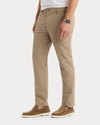 Side view of model wearing Timber Wolf Go Pro Pant with AceFlex, Slim Fit.