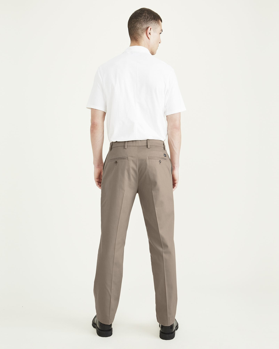 Back view of model wearing Timber Wolf Signature Iron Free Khakis, Classic Fit with Stain Defender®.