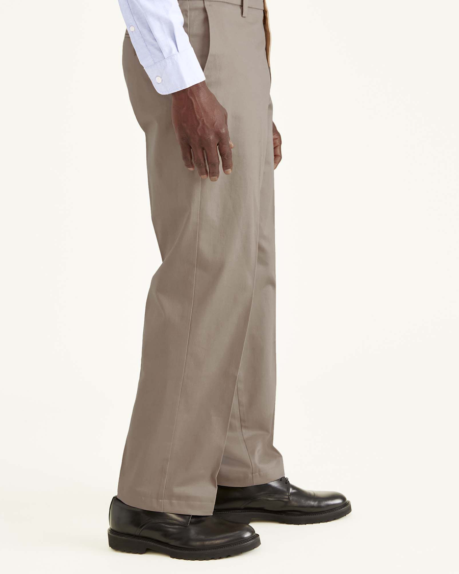 Side view of model wearing Timber Wolf Signature Khakis, Classic Fit.