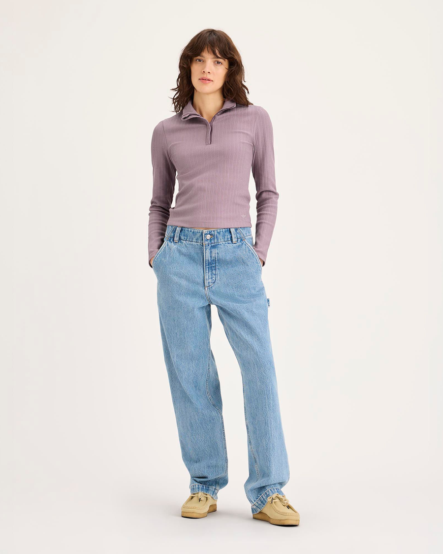 Front view of model wearing Toadstool Go Quarter-Zip Pullover, Slim Fit.