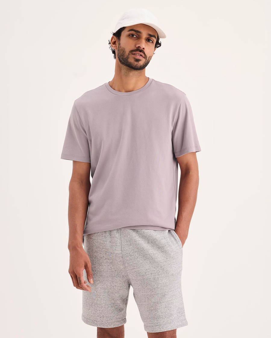 Front view of model wearing Toadstool Go Tee, Slim Fit.