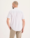 Back view of model wearing Toadstool Signature Stain Defender Shirt, Classic Fit.