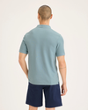 Back view of model wearing Tourmaline Original Polo, Slim Fit.