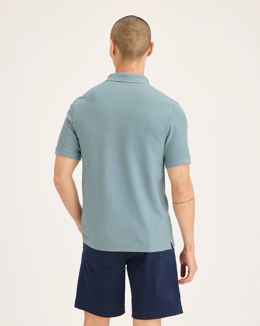 Back view of model wearing Tourmaline Original Polo, Slim Fit.