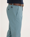 Side view of model wearing Tourmaline Ultimate Chinos, Slim Fit.