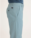 Side view of model wearing Tourmaline Ultimate Chinos, Straight Fit.